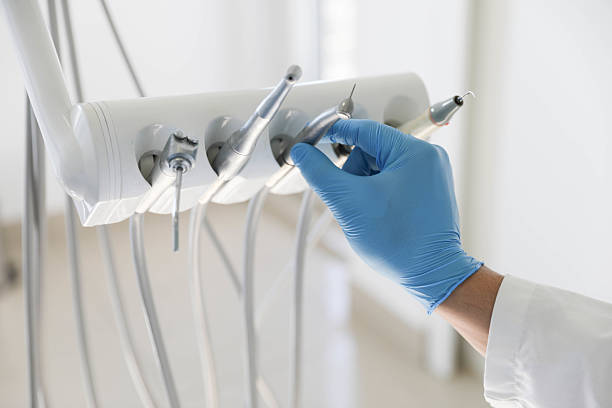 Professional Tooth Extraction technician working in New Hanover County County, NC